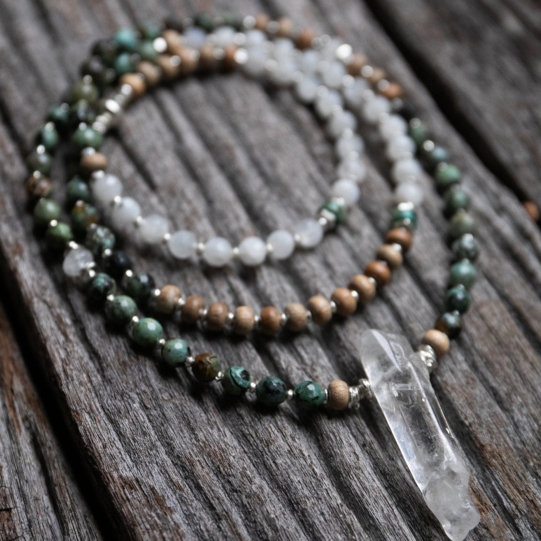 African Turquoise, Rainbow Moonstone + Wood Asymmetrical 108 Beaded Mala Necklace with Crystal Point Pendant + Thai Hill Tribe Silver