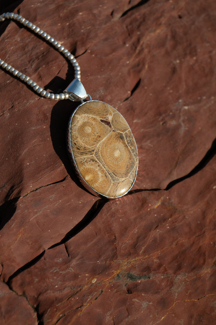 Oval Fossil Coral Pendant in Beaten Sterling Silver