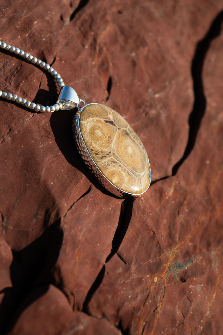 Oval Fossil Coral Pendant in Beaten Sterling Silver