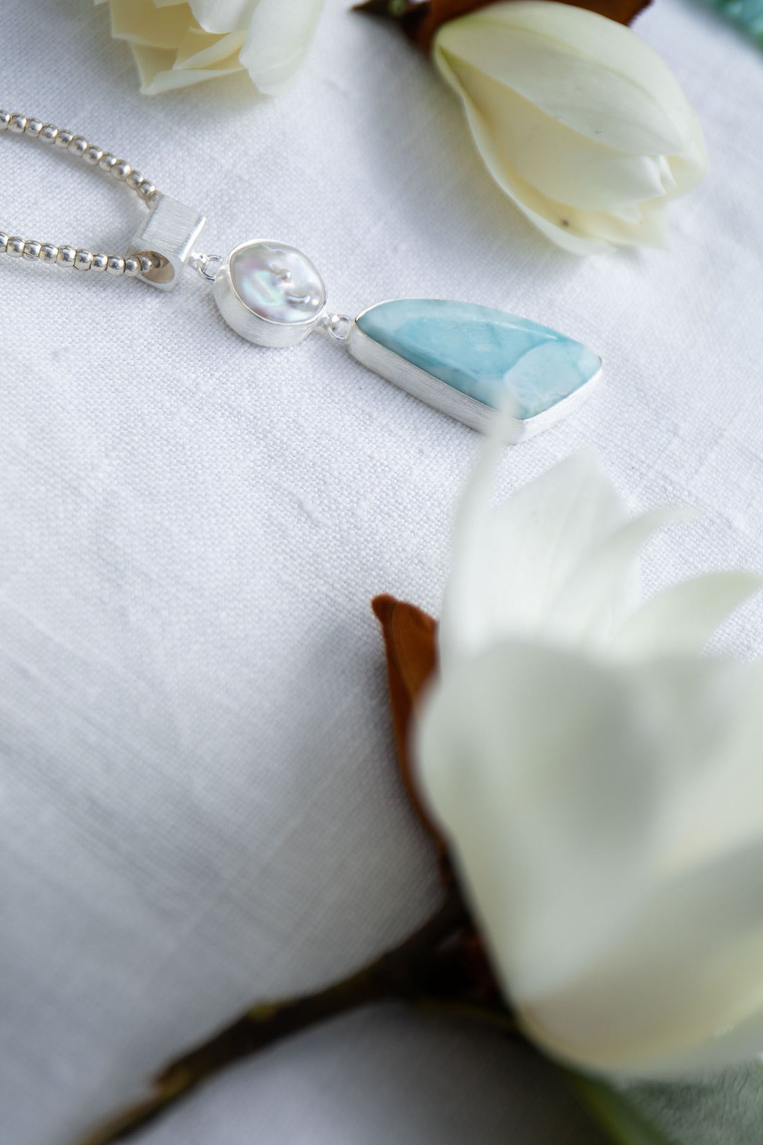 Larimar and Freshwater Pearl Pendant in Unique Silver Setting