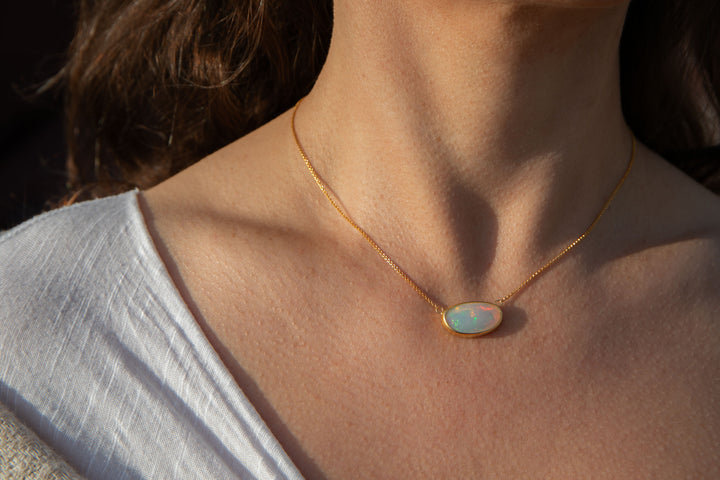 Stunning Ethiopian Opal Pendant set on 14k Gold Plated Sterling Silver Chain