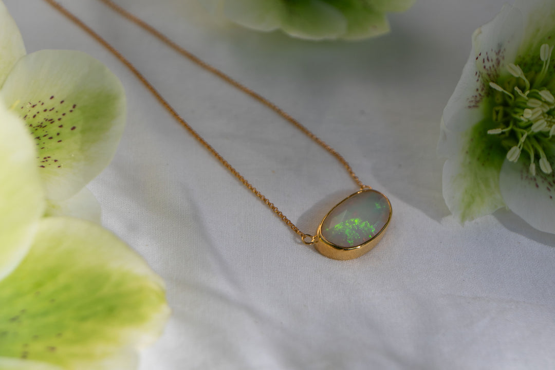 Stunning Ethiopian Opal Pendant set on 14k Gold Plated Sterling Silver Chain