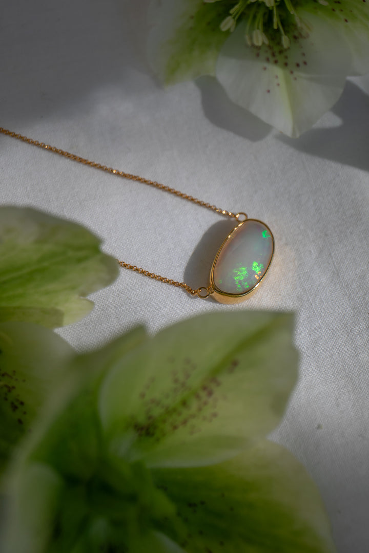 Stunning Ethiopian Opal Pendant set on 14k Gold Plated Sterling Silver Chain