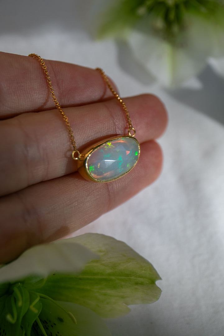 Stunning Ethiopian Opal Pendant set on 14k Gold Plated Sterling Silver Chain