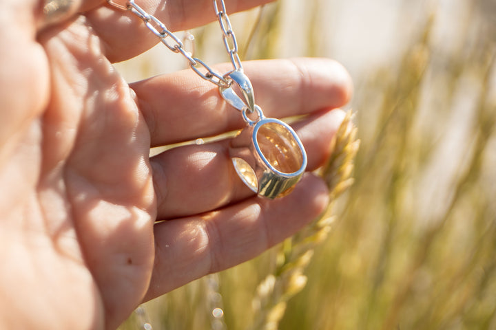 Oval Faceted Natural Citrine Pendant in Unique Sterling Silver Setting