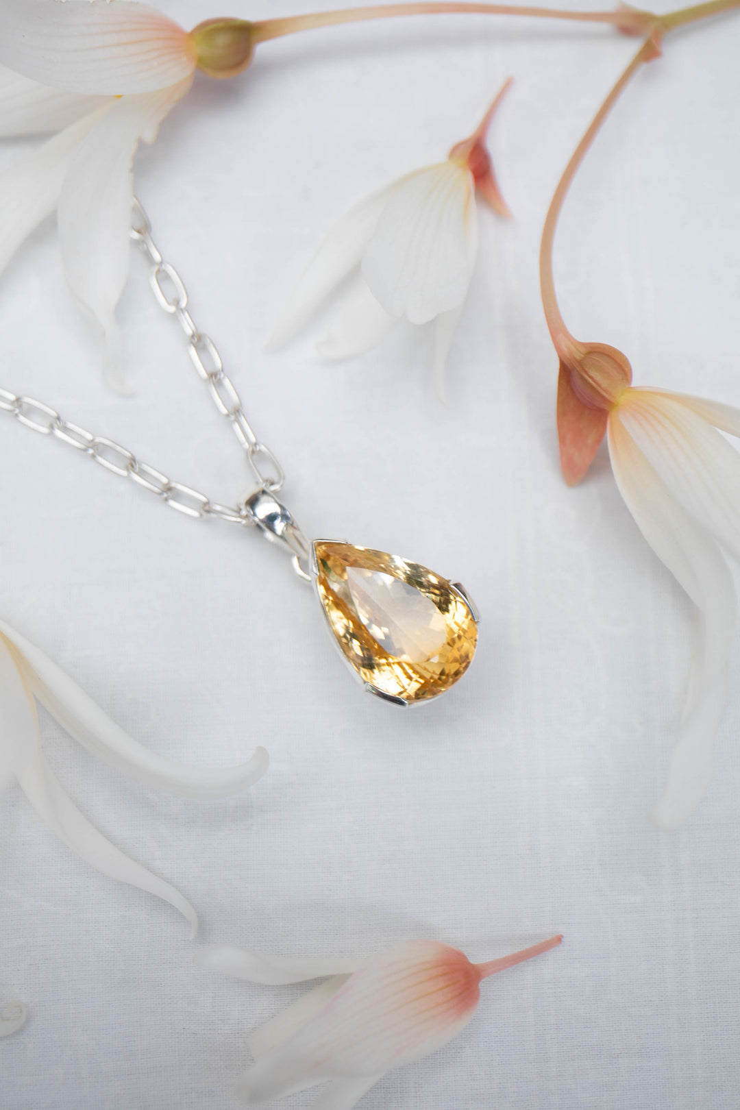 Teardrop Faceted Natural Citrine Pendant in Unique Sterling Silver Setting