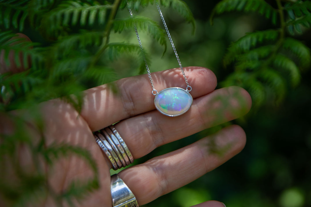 Stunning Ethiopian Opal Pendant set on Sterling Silver Chain