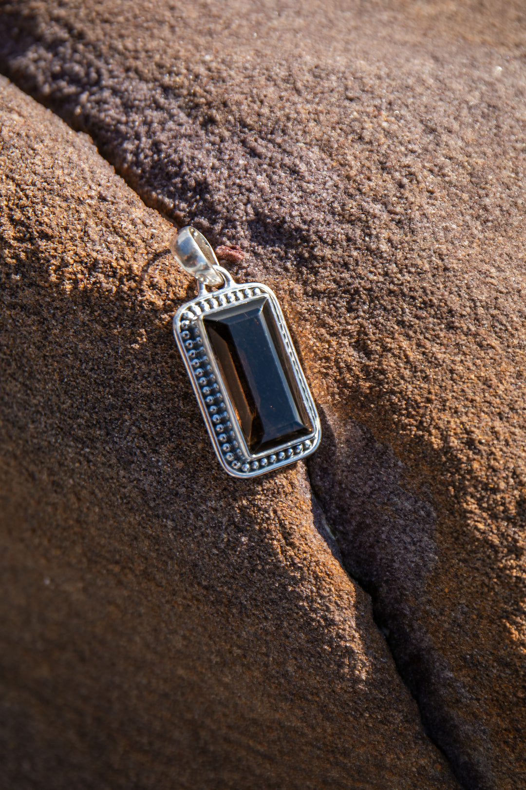 Faceted Smokey Quartz Pendant set in Decorative Sterling Silver Setting