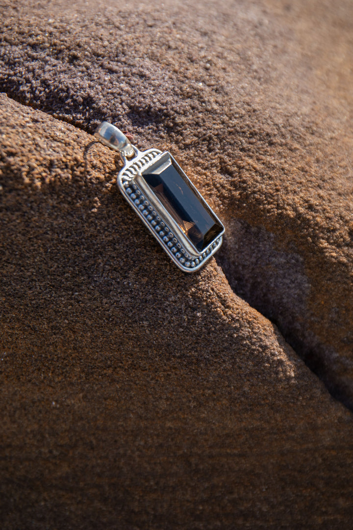 Faceted Smokey Quartz Pendant set in Decorative Sterling Silver Setting