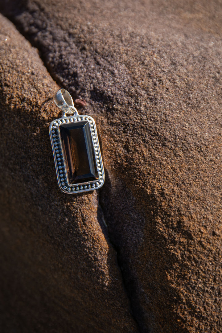 Faceted Smokey Quartz Pendant set in Decorative Sterling Silver Setting