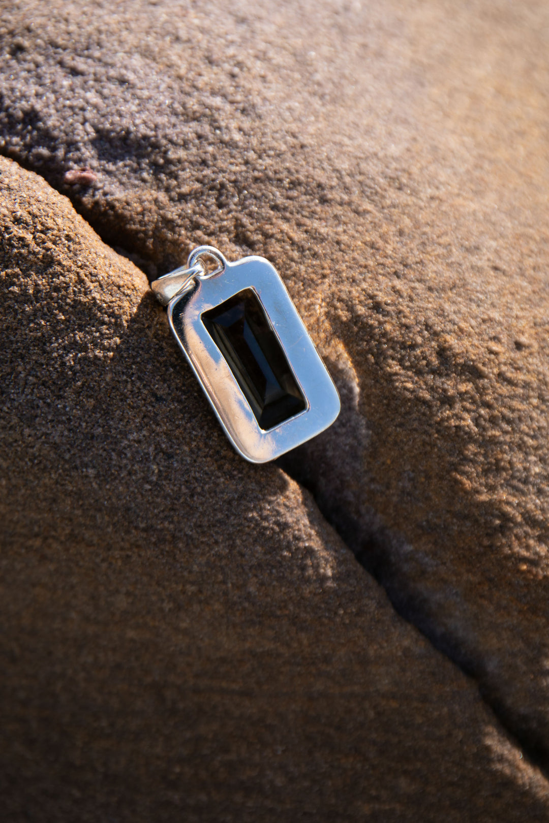 Faceted Smokey Quartz Pendant set in Decorative Sterling Silver Setting