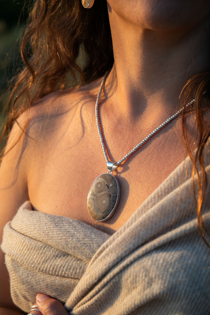Oval Fossil Coral Pendant in Beaten Sterling Silver