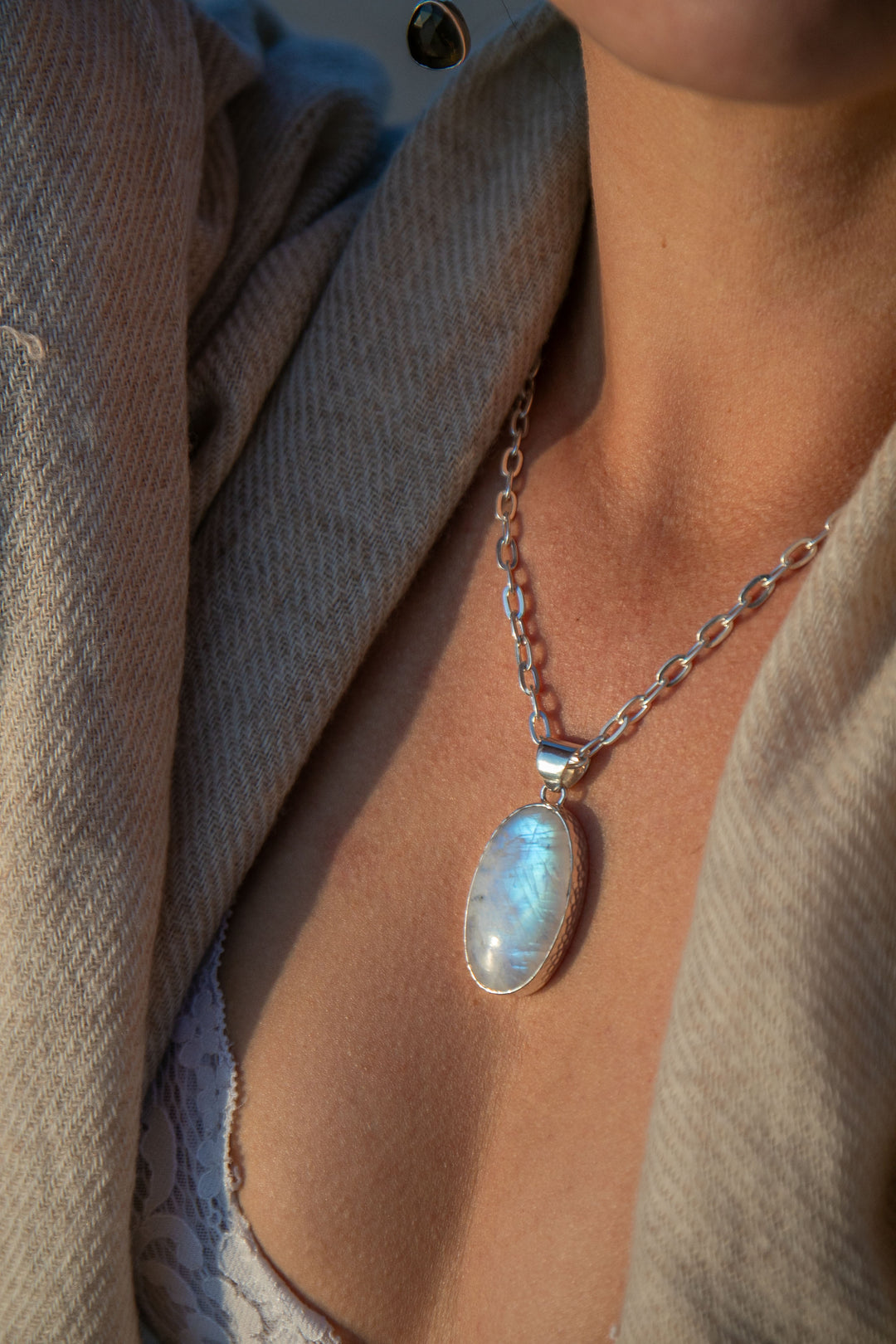 Rainbow Moonstone Pendant in Beaten Sterling Silver Setting