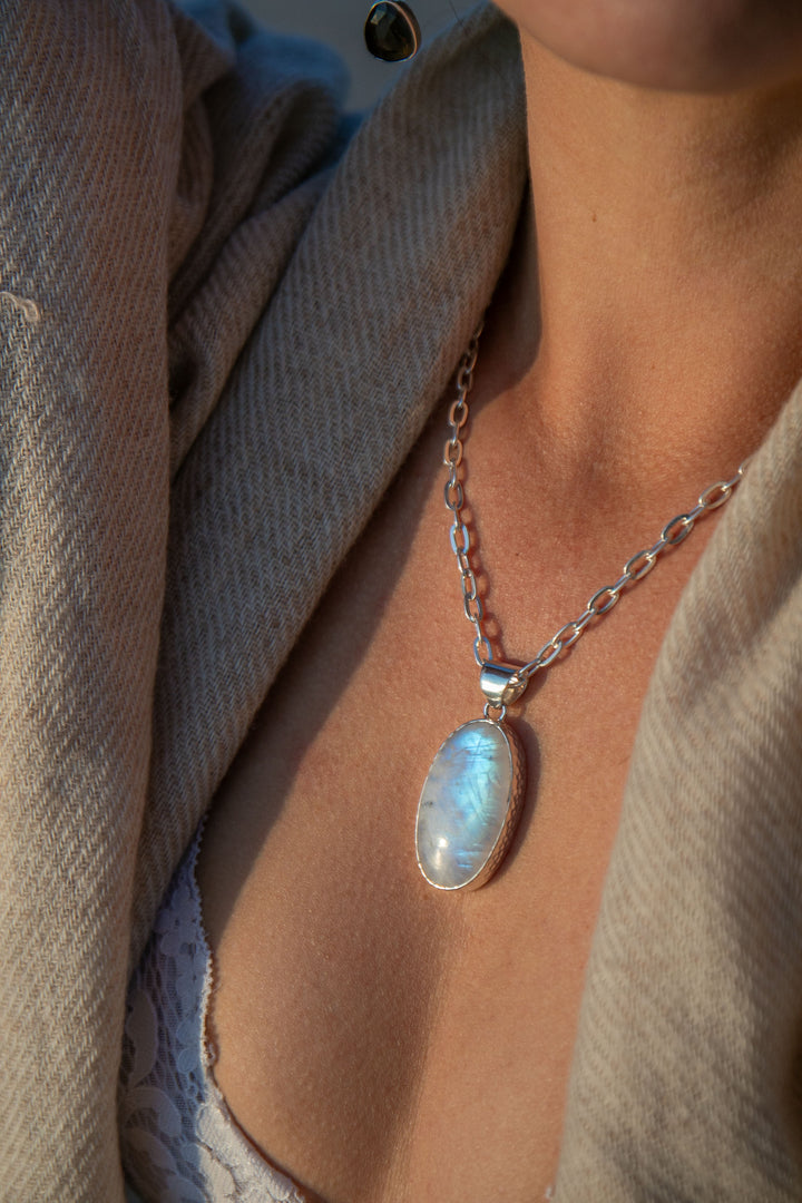 Rainbow Moonstone Pendant in Beaten Sterling Silver Setting