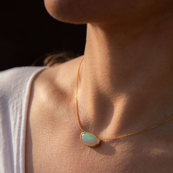 Stunning Ethiopian Opal Pendant set on 14k Gold Plated Sterling Silver Chain