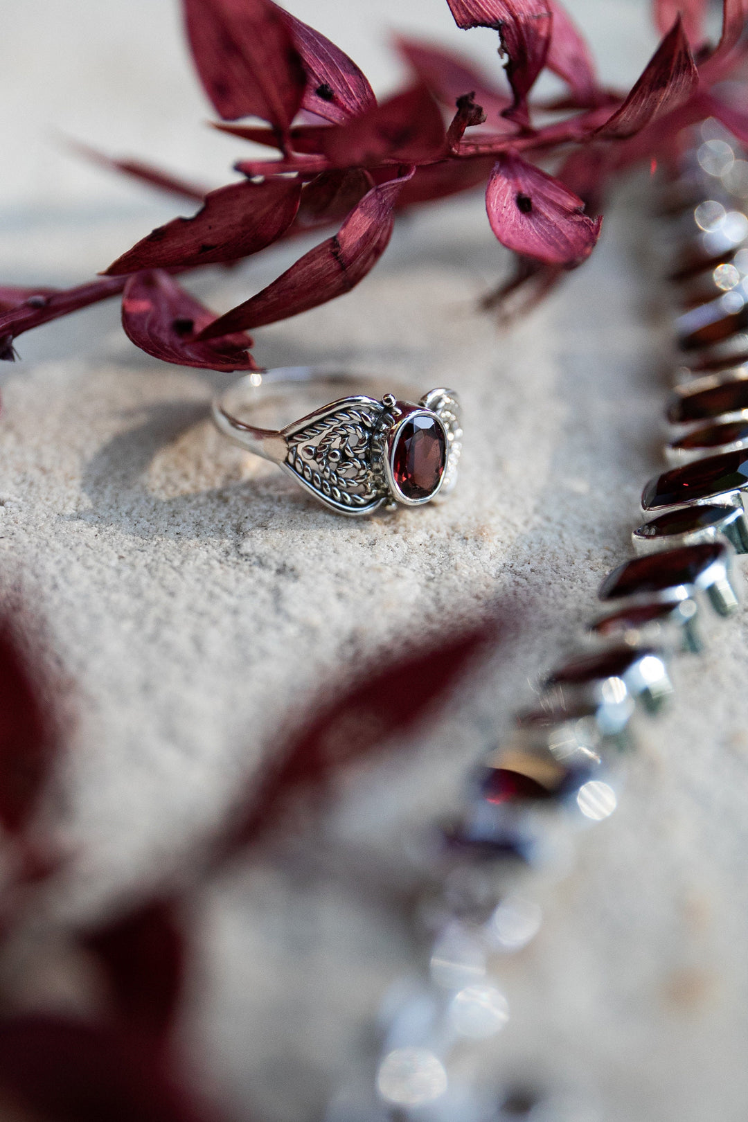 Lovely Garnet Ring set in Sterling Silver Filigree Band - Size 7 US