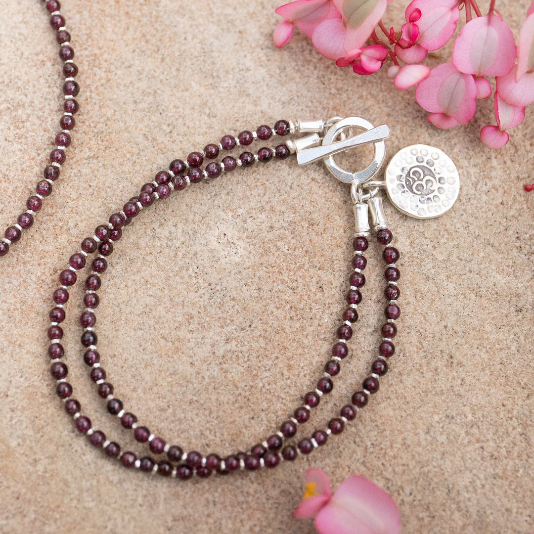 Double Garnet Beaded Bracelet with Thai Hill Tribe Silver and Om Charm