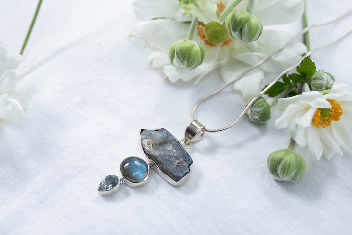 Raw Labradorite and Topaz Pendant set in 92.5% Sterling Silver